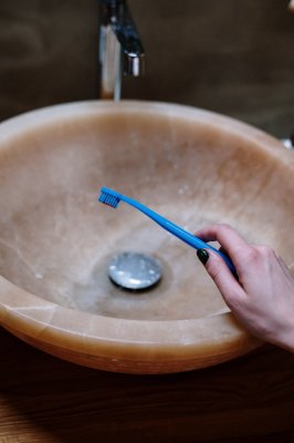 toothbrush over a nice sink